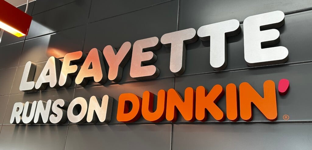 Lafayette Dunkin' interior sign reading, "Lafayette Runs on Dunkin'"