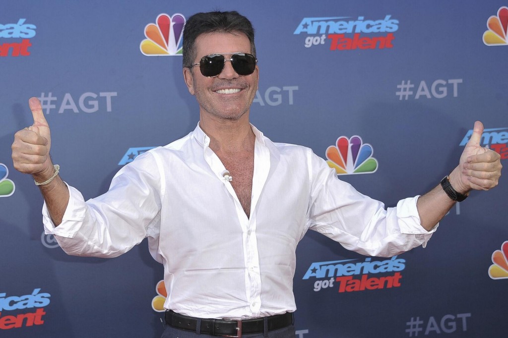 Simon Cowell ‘doing Fine’ After Breaking Back In Bike Accident