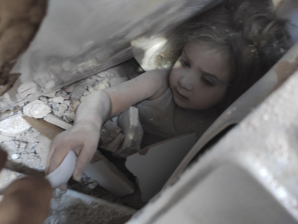 Turkish Rescuers Pull Girl From Rubble 4 Days After Quake. See Scenes From The Rescue.