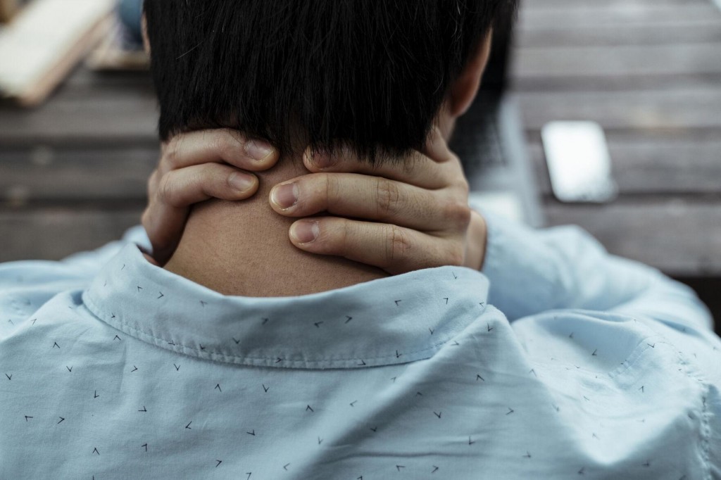 5 Techniques To Give Yourself A Massage At Home, From A Massage Therapist