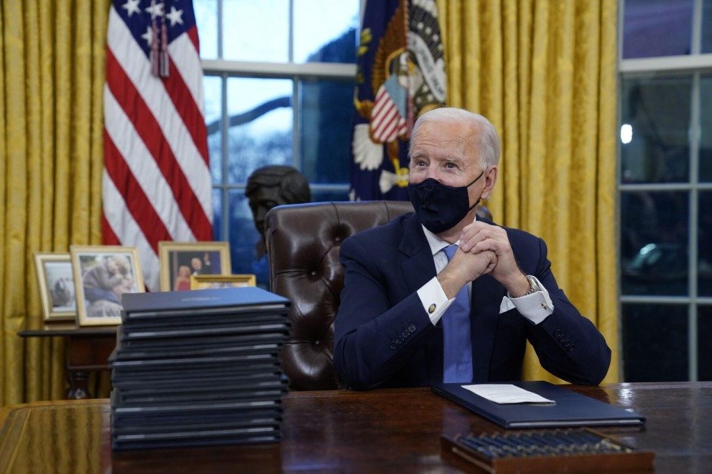 Biden Signs Flurry Of Executive Orders On Coronavirus, Climate Change, Immigration And More