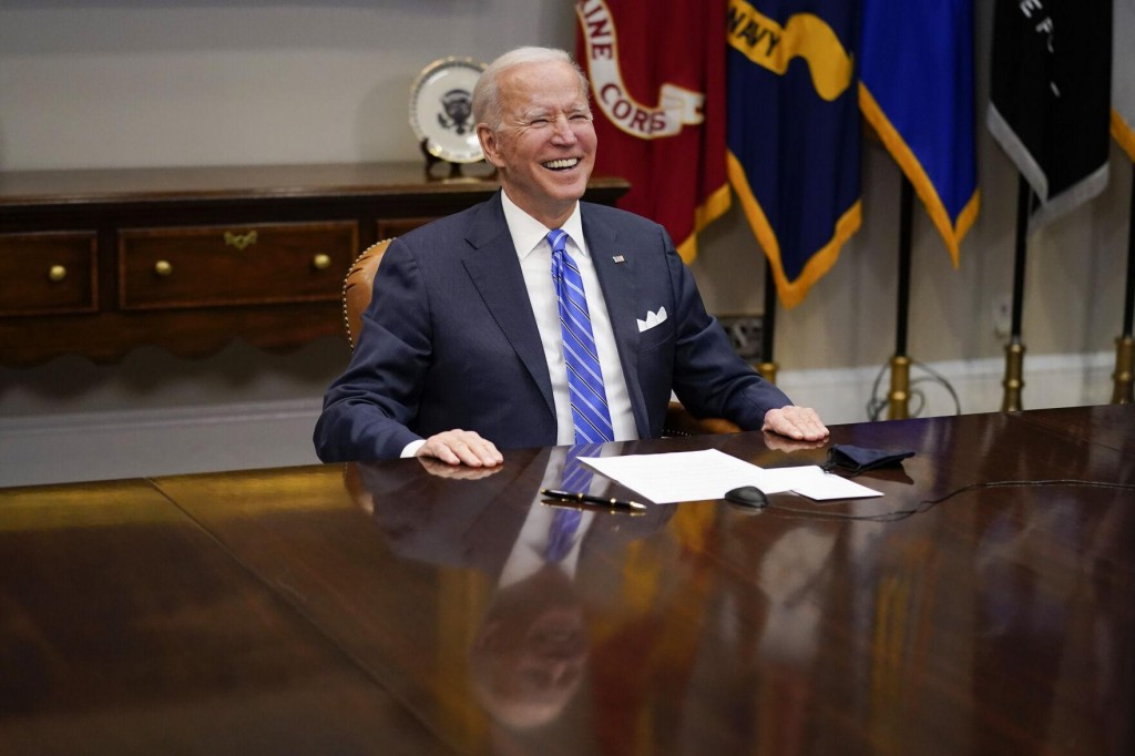 The Latest: Ap Poll: Americans Back Biden’s Virus Response