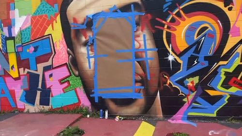 George Floyd Mural In Houston Defaced With A Racial Epithet