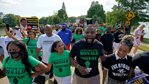Ronald Greene’s Family Marches Arm In Arm With Supporters As They Seek Justice