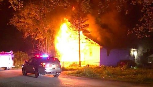 Firefighters Rescue Man From Burning Home
