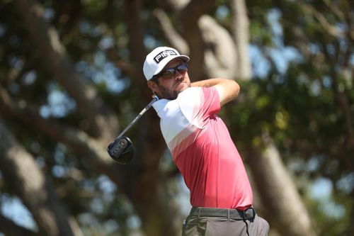 Conners Waves Canadian Flag From Top Of Gusty Pga Leaderboard