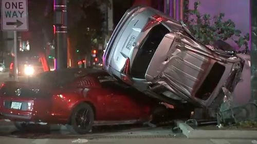 Wild Crash Leaves Suv On Top Of Car