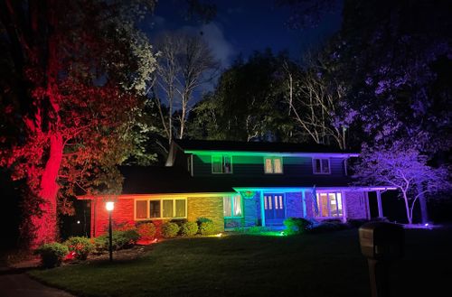 A Wisconsin Couple Couldn’t Fly Their Pride Flag, So They Lit Up Their Home Like A Rainbow