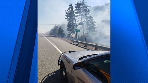 Highway Reopens As Wildfire Burns; Evacuations Lowered