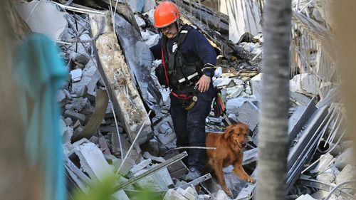 Rescuers Battle Fire, Noise And Shifting Steel And Concrete As They Scramble To Save Lives