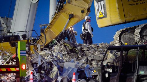 Rescue Teams Withstand Wind, Lightning And Heat On 12 Hour Shifts To Search For The Victims Of The Florida Building Collapse