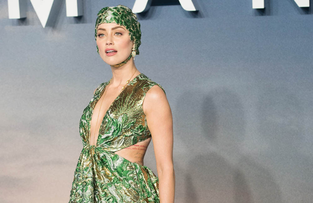 Aquaman Bosses Never Considered Axing Amber Heard