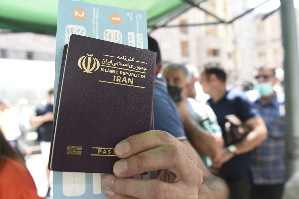 Desperate For Vaccines Amid Surge, Iranians Flock To Armenia