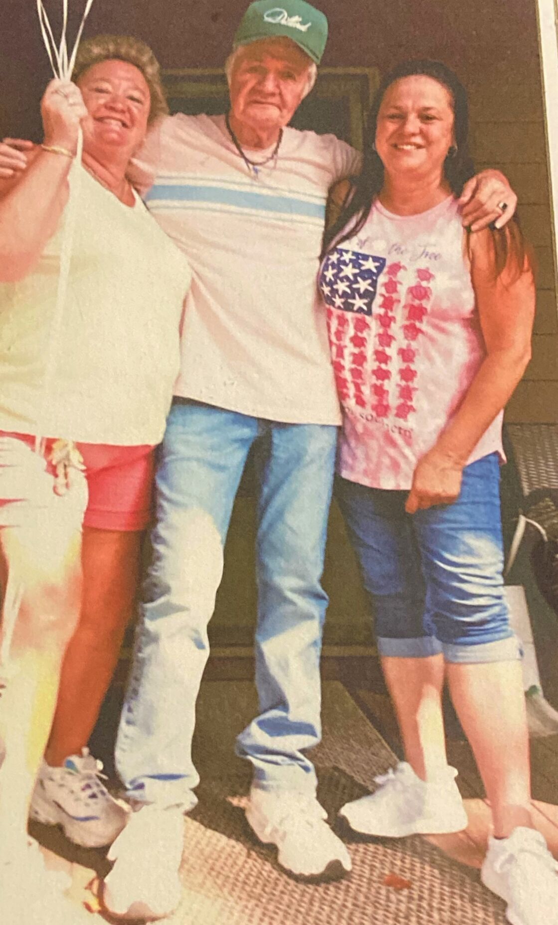 <p>Teresa Tysinger Williams, right, celebrating a birthday with her father, center, and sister Sheila Tysinger a few years back.</p>