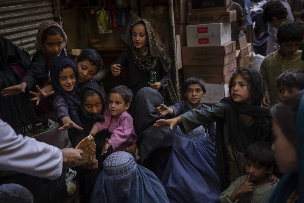The Latest: Pakistan, Iran Leaders Meet On Afghanistan