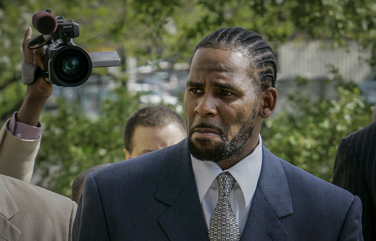<p>This photo from Friday May 9, 2008, shows R. Kelly arriving for the first day of jury selection in his child pornography trial at the Cook County Criminal Courthouse in Chicago. R. Kelly, the R&B superstar known for his anthem “I Believe I Can Fly,” was convicted Monday in a sex trafficking trial after decades of avoiding criminal responsibility for numerous allegations of misconduct with young women and children. </p>