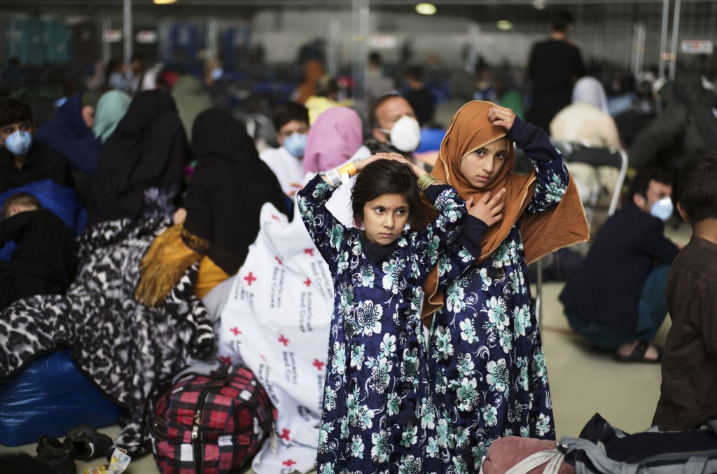 The Latest: About 60,000 In Afghan Evacuation Brought To Us