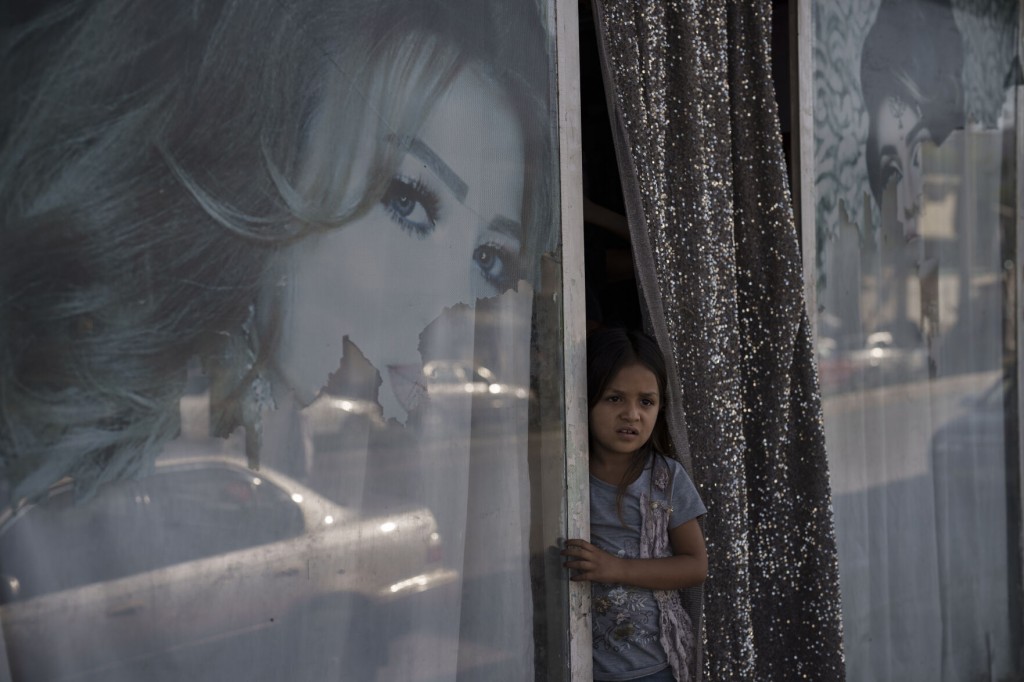 The Latest: Taliban To Female Kabul City Workers: Stay Home