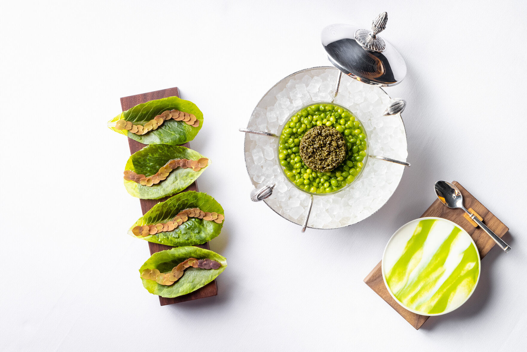 <p>One of the items on the new vegan Eleven Madison Park menu is tonburi with pea cream and baby lettuce.</p>