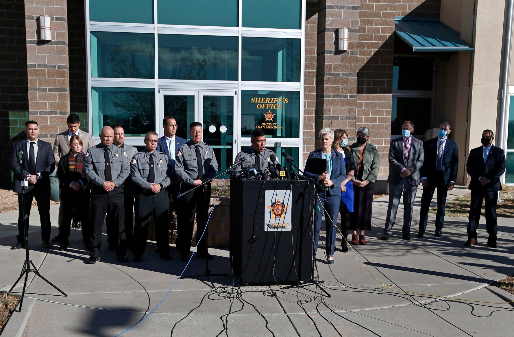 <p>Santa Fe County Sheriff Adan Mendoza, center left, and Santa Fe District Attorney Mary Carmack-Altwies, center right, attend a news conference in Santa Fe, N.M. Wednesday, Oct. 27, 2021. New Mexico authorities said Wednesday they have recovered a lead projectile believed to have been fired from the gun used in the fatal movie-set shooting. (AP Photo/Andres Leighton)</p>