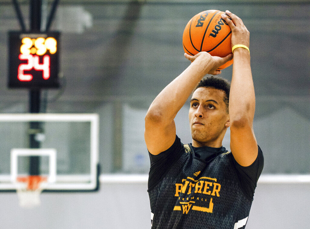 College Basketball Freshman Phenom Baldwin Savors Chance To Play For His Dad