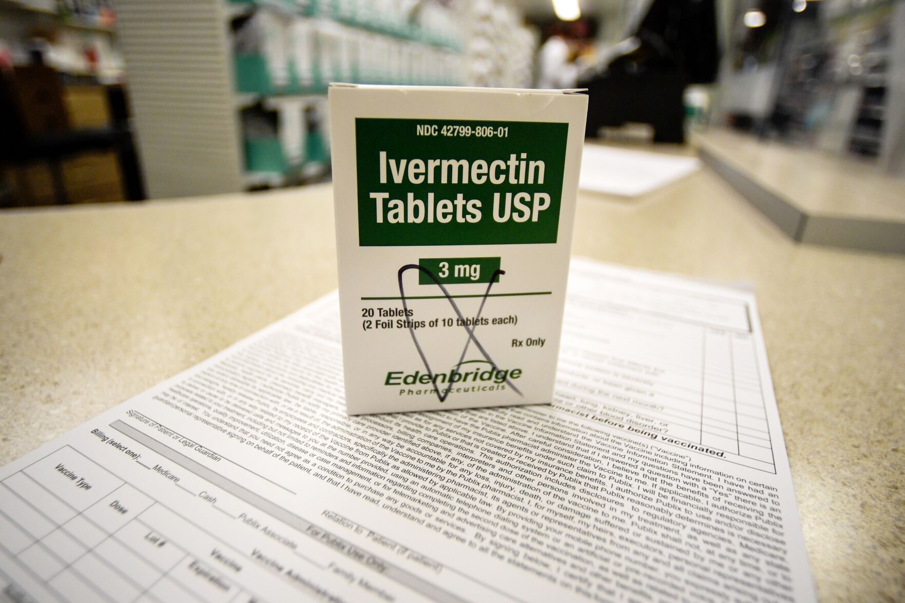 <p>A box of ivermectin is shown in a pharmacy as pharmacists work in the background, Thursday, Sept. 9, 2021, in Ga. (AP Photo/Mike Stewart)</p>