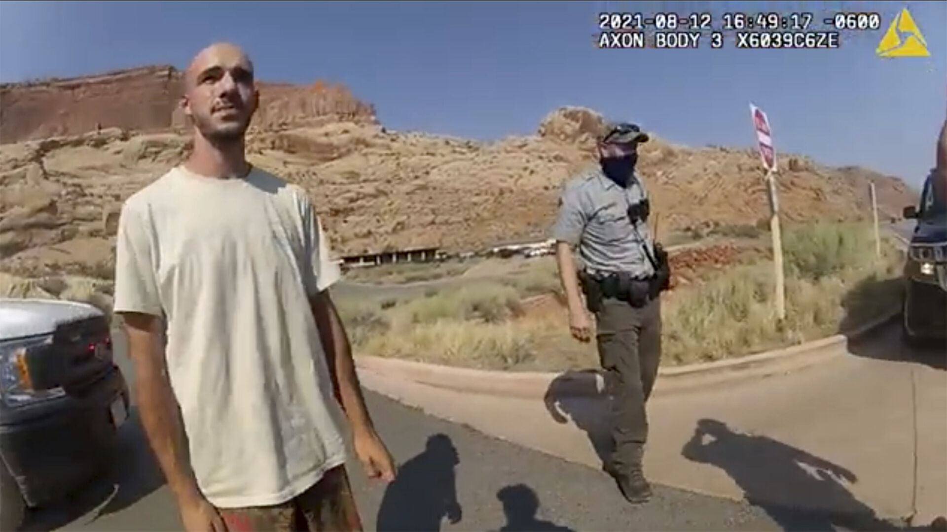 <p>FILE - This Aug. 12, 2021 file photo from video provided by the Moab, Utah, Police Department shows Brian Laundrie talking to a police officer after police pulled over the van he was traveling in with his girlfriend, Gabrielle "Gabby" Petito, near the entrance to Arches National Park in Utah. The FBI on Thursday, Oct. 21, 2021, identified human remains found in a Florida nature preserve as those of Laundrie, a person of interest in the death of girlfriend Gabby Petito while the couple was on a cross-country road trip.</p>