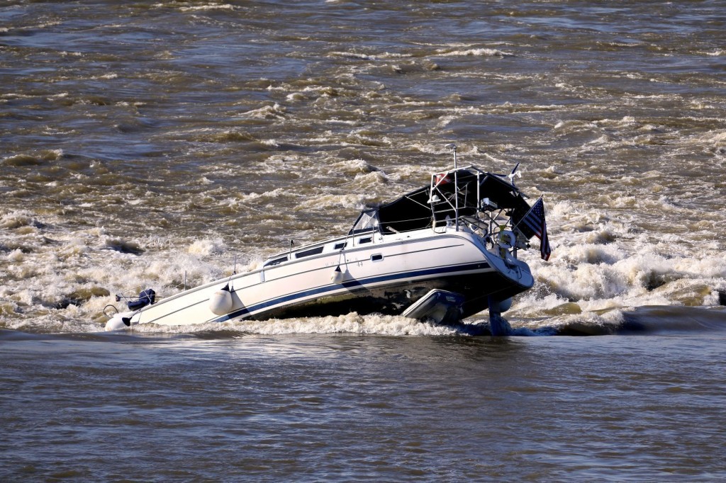A Rocky Trip: Sailboat Owner Misses Exit, Now Stuck On Chain Of Rocks In Mississippi River