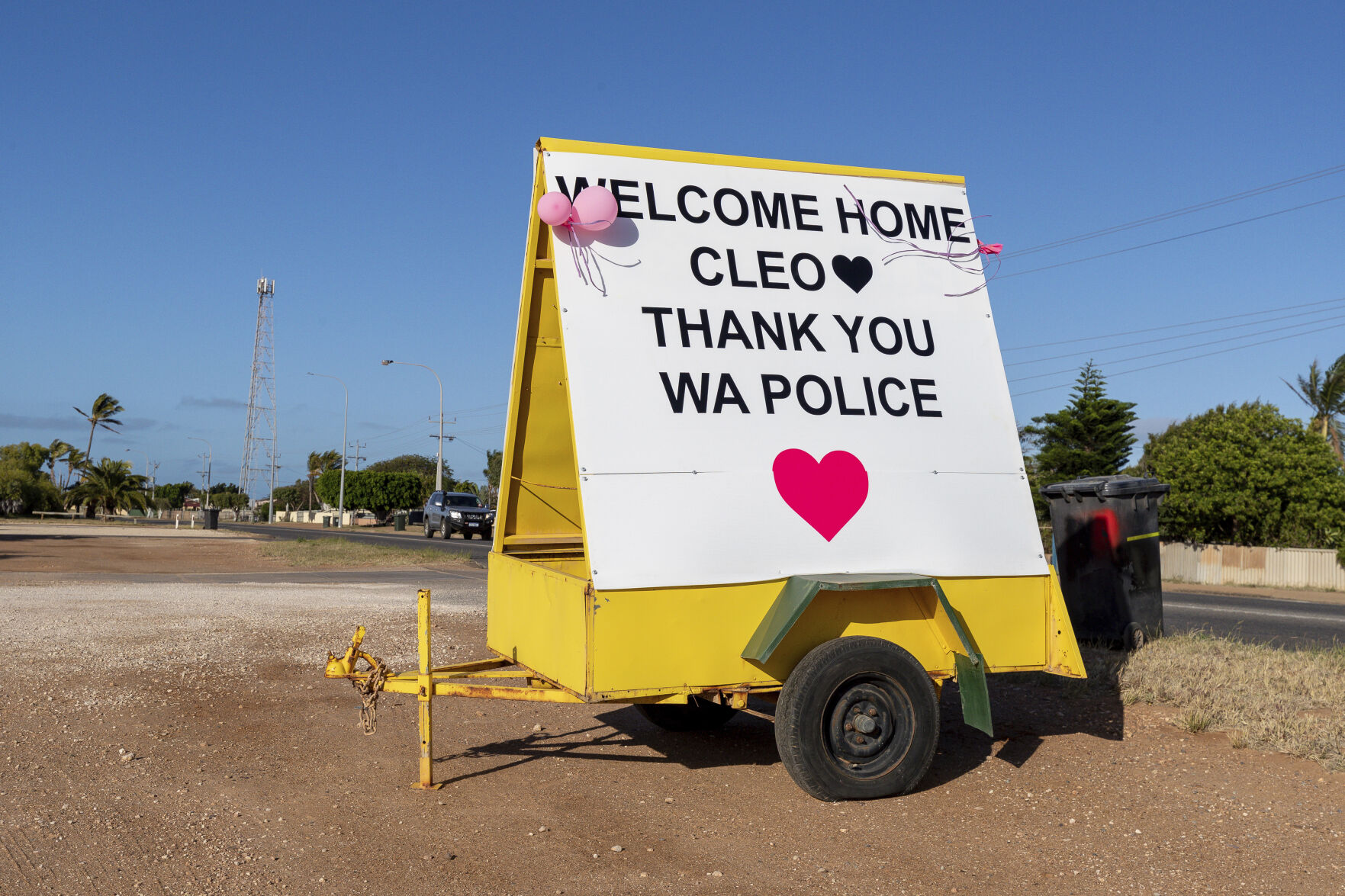 <p>A sign, which reads, 'Welcome Home Cleo, Thank You WA Police' is seen in support of missing girl Cleo Smith who was rescued by Western Australian Police Wedensday morning in Carnarvon, 900 km (560 miles) north of the capital Perth in Western Australia, Thursday, Nov. 4, 2021. </p>