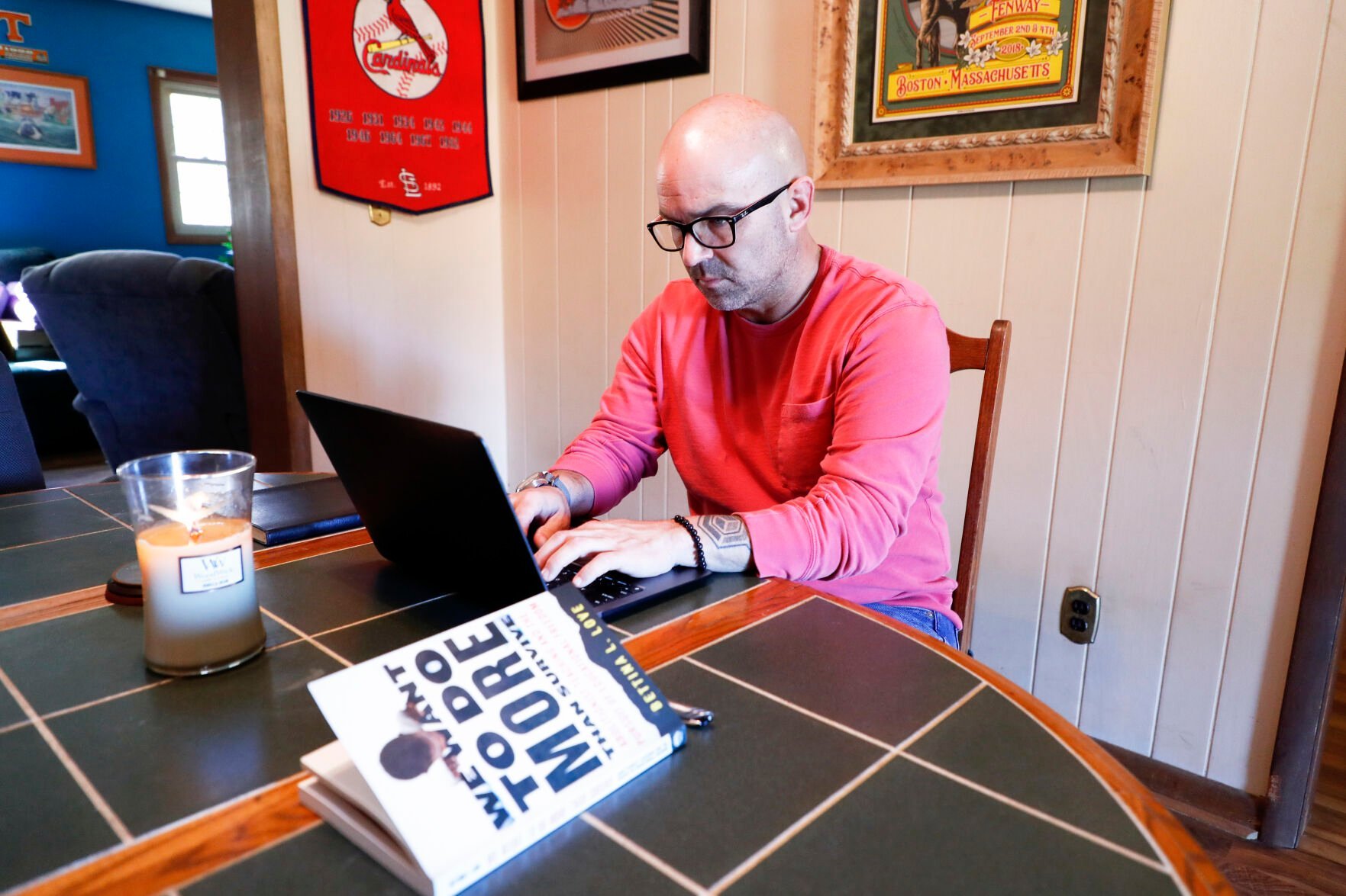 <p>Matt Hawn works at his home Nov. 12, 2021, in Kingsport, Tenn. Hawn was fired from Sullivan Central High School after school officials said he used materials with offensive language and failed to provide a conservative viewpoint during discussions of white privilege in his contemporary issues class, which has since been eliminated. </p>