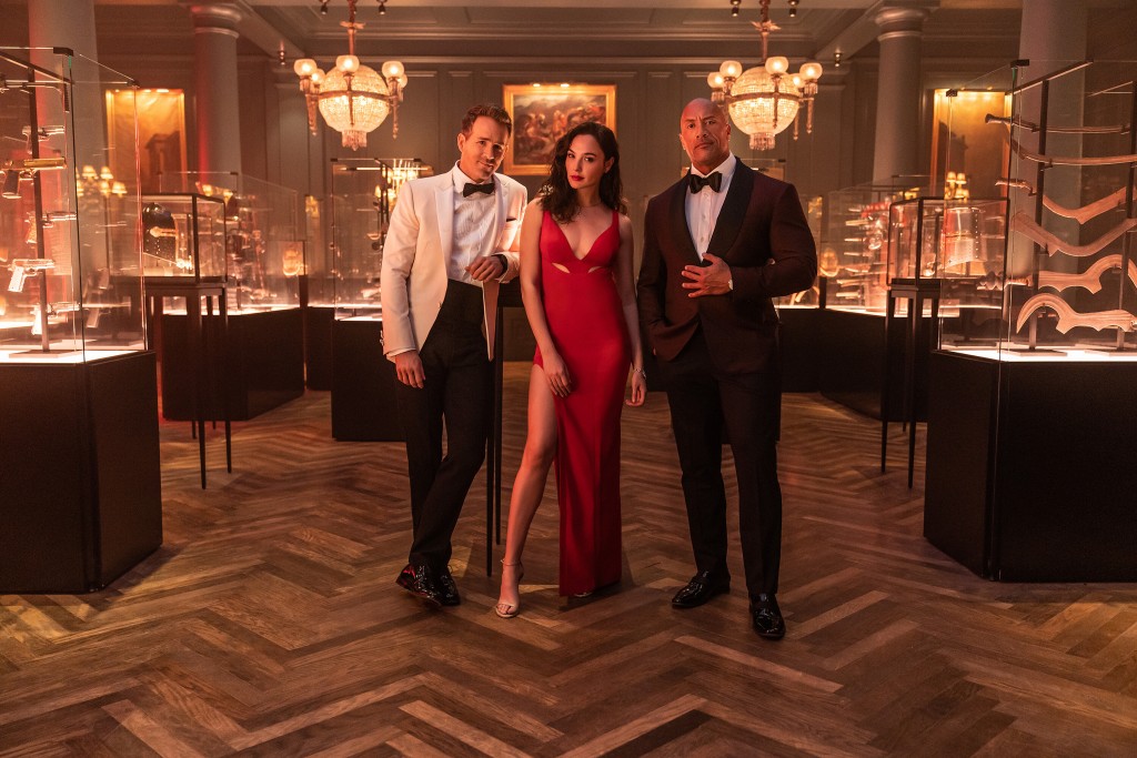 Dwayne Johnson, Ryan Reynolds And Gal Gadot Go For The Green In ‘red Notice’