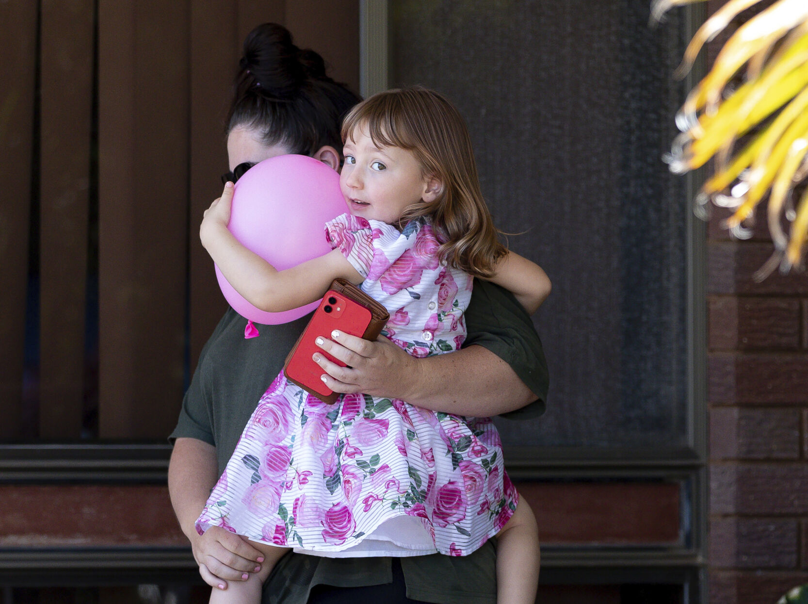 <p>Cleo Smith, right, and her mother Ellie Smith leave a house where they spent the night after 4-year-old Cleo was rescued in Carnarvon, Australia, Thursday, Nov. 4, 2021. </p>