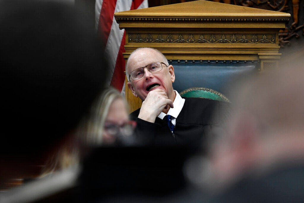 <p>Judge Bruce Schroeder makes a last-minute change to how jury instructions would be received by the jury during Kyle Rittenhouse's trial at the Kenosha County Courthouse in Kenosha, Wis., on Monday, Nov. 15, 2021. </p>