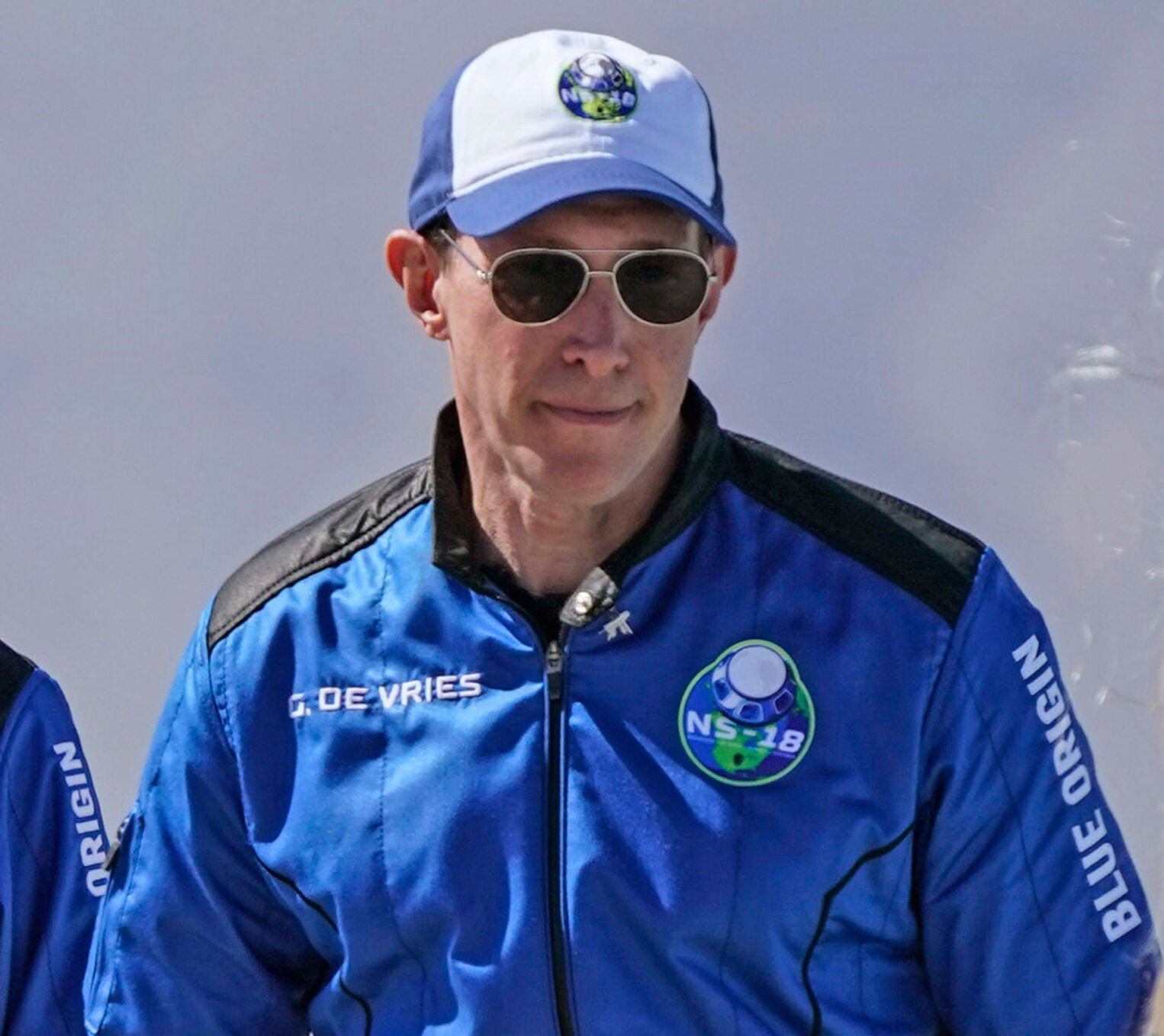 <p>Glen de Vries, among four passengers on Blue Origin's New Shepard rocket, arrives for a media availability at the spaceport near Van Horn, Texas, on Oct. 13, 2021. He died in the crash of a single-engine Cessna 172 that went down Thursday in a wooded area of New Jersey.</p>