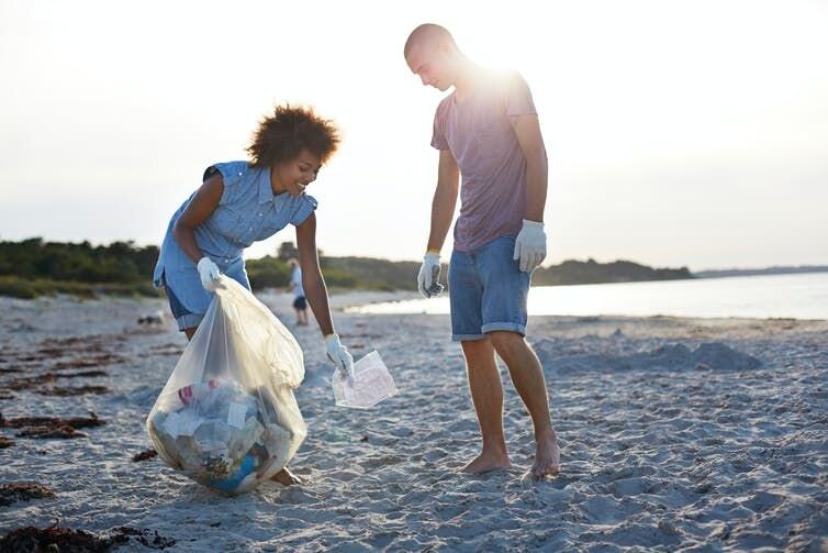 <p>Recycling and reducing waste helps create a cleaner environment with better use of natural resources. <a class="source" href="https://www.gettyimages.com/detail/photo/two-people-collecting-trash-on-beach-royalty-free-image/186360537">Klaus Vedfelt via Getty Images</a></p>