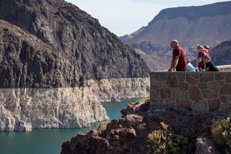 <p>The ‘bathtub ring’ around Lake Mead in July 2021 reflected record low water levels in this important Colorado River reservoir. The reservoir fell below 35% capacity and triggered water use restrictions. <a class="source" href="https://www.gettyimages.com/detail/news-photo/the-white-bathtub-ring-around-lake-mead-shows-the-record-news-photo/1233759073">Photo by David McNew/Getty Images</a></p>
