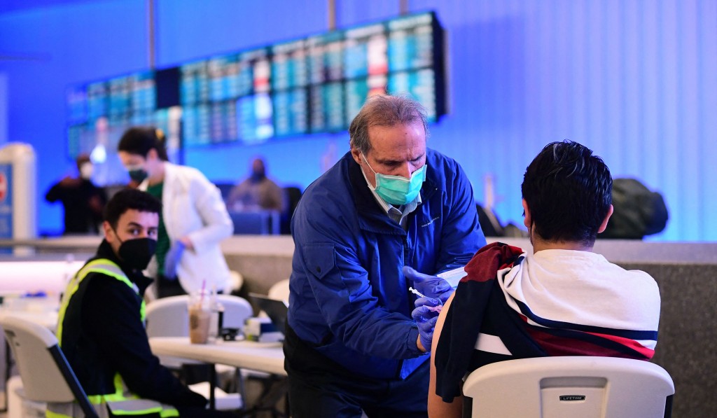 Flying Home After The Holidays? Getting Vaccinated Or Boosted Is The First Step Toward Safe Travel, Expert Says