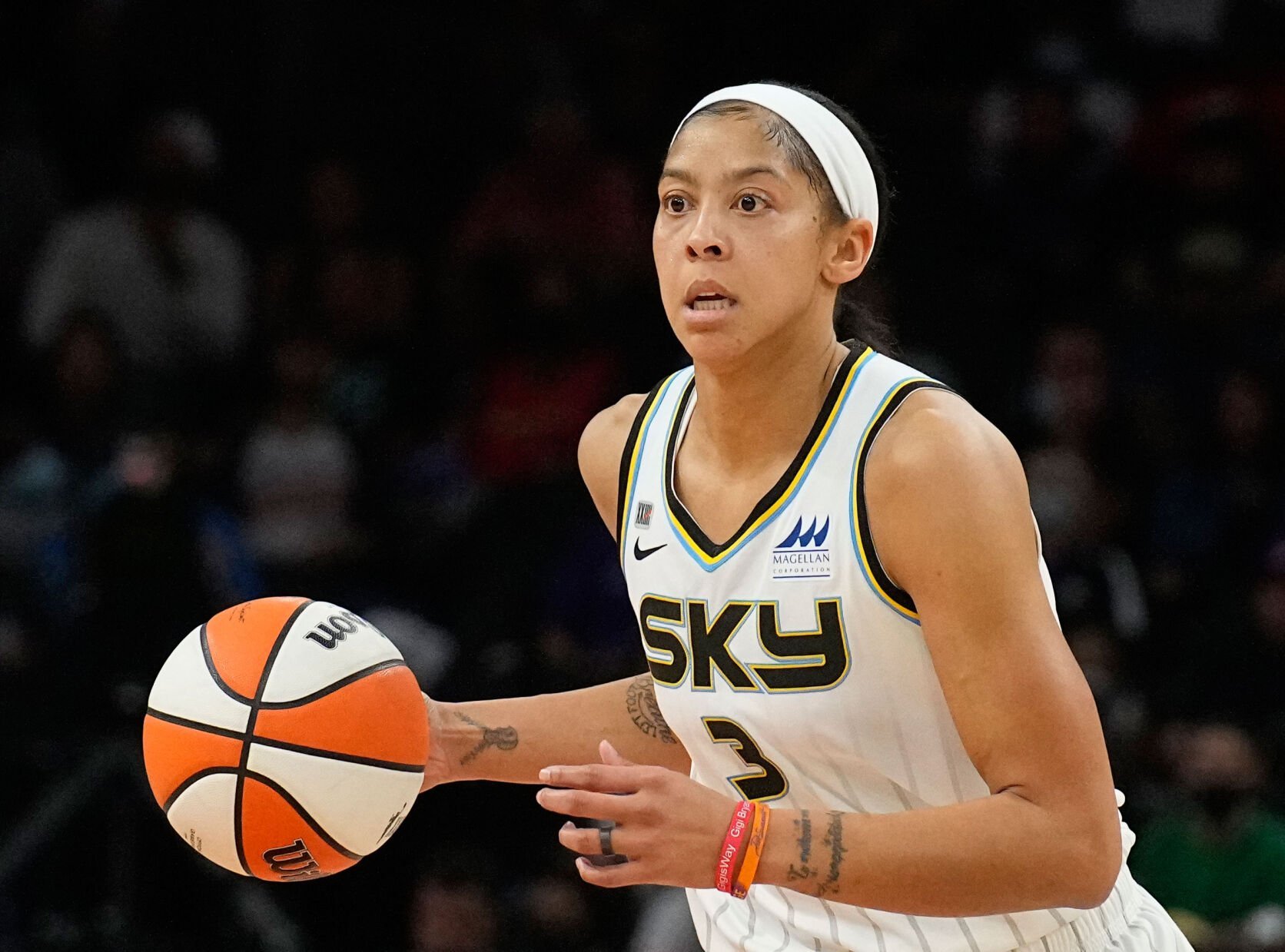 <p>Chicago Sky center Candace Parker moves the ball during Game 2 of the WNBA Finals against the Phoenix Mercury on Oct. 13, 2021, in Phoenix. She helped lead the Sky to the franchise's first WNBA championship.</p>