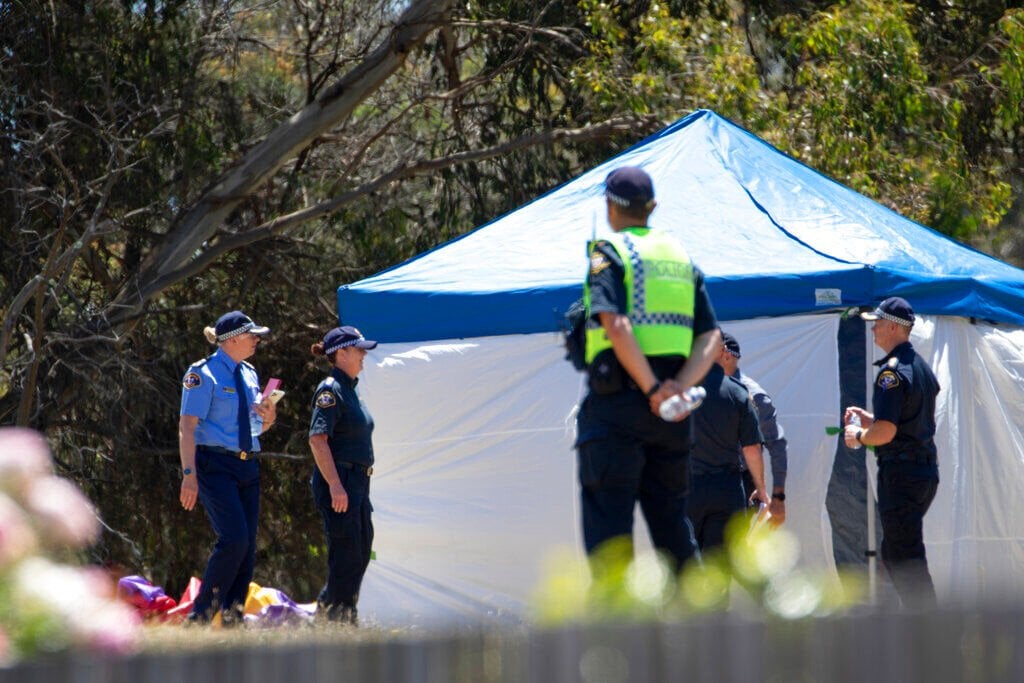 <p>Emergency services personnel work the scene of a deadly incident involved with a jumping castle at the Hillcrest Primary School in Devonport, Tasmania, Thursday, Dec. 16, 2021. </p>