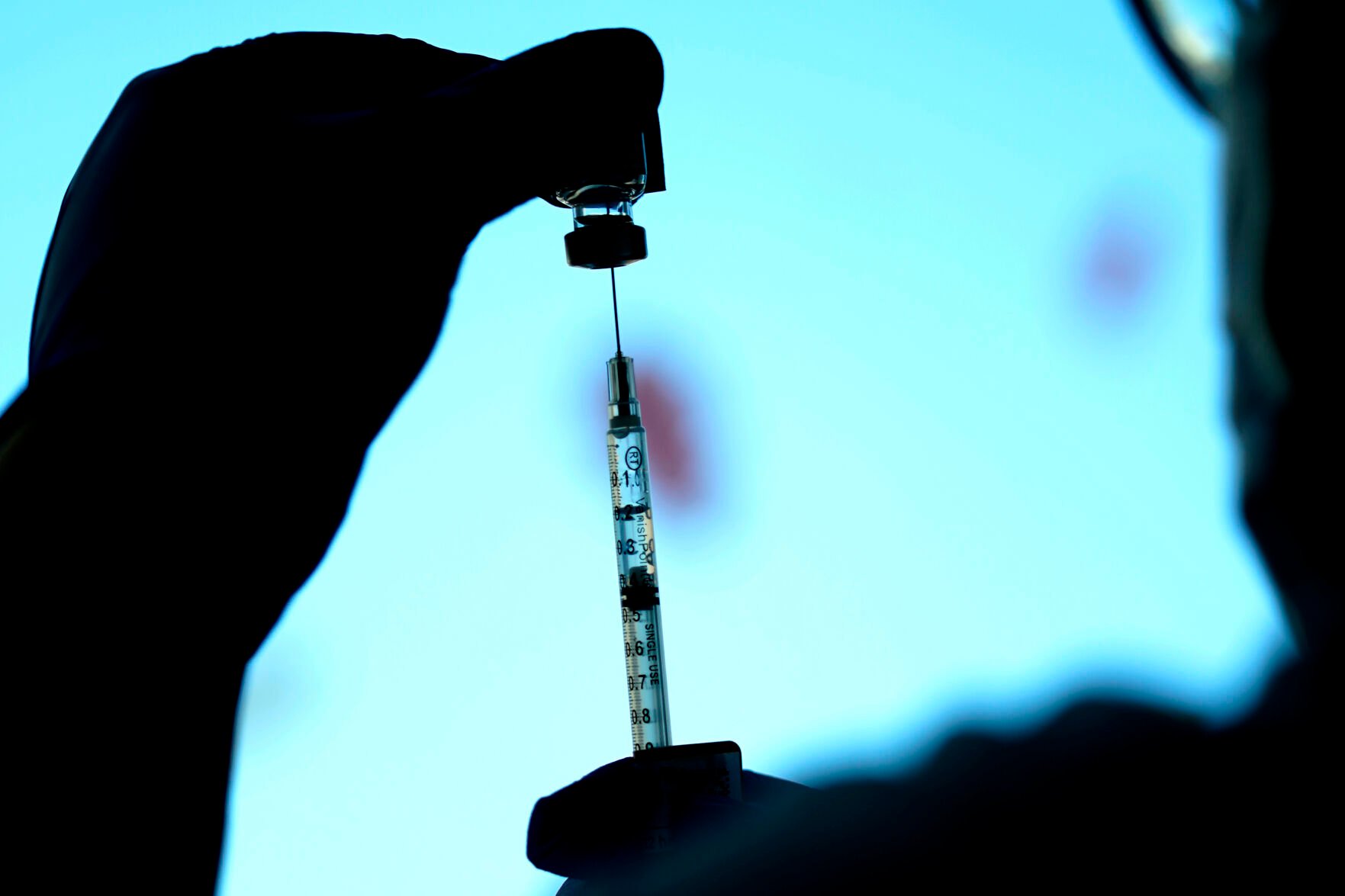 <p>A dose of a Pfizer COVID-19 vaccine is prepared at Lurie Children's hospital, Nov. 5, 2021, in Chicago.</p>
