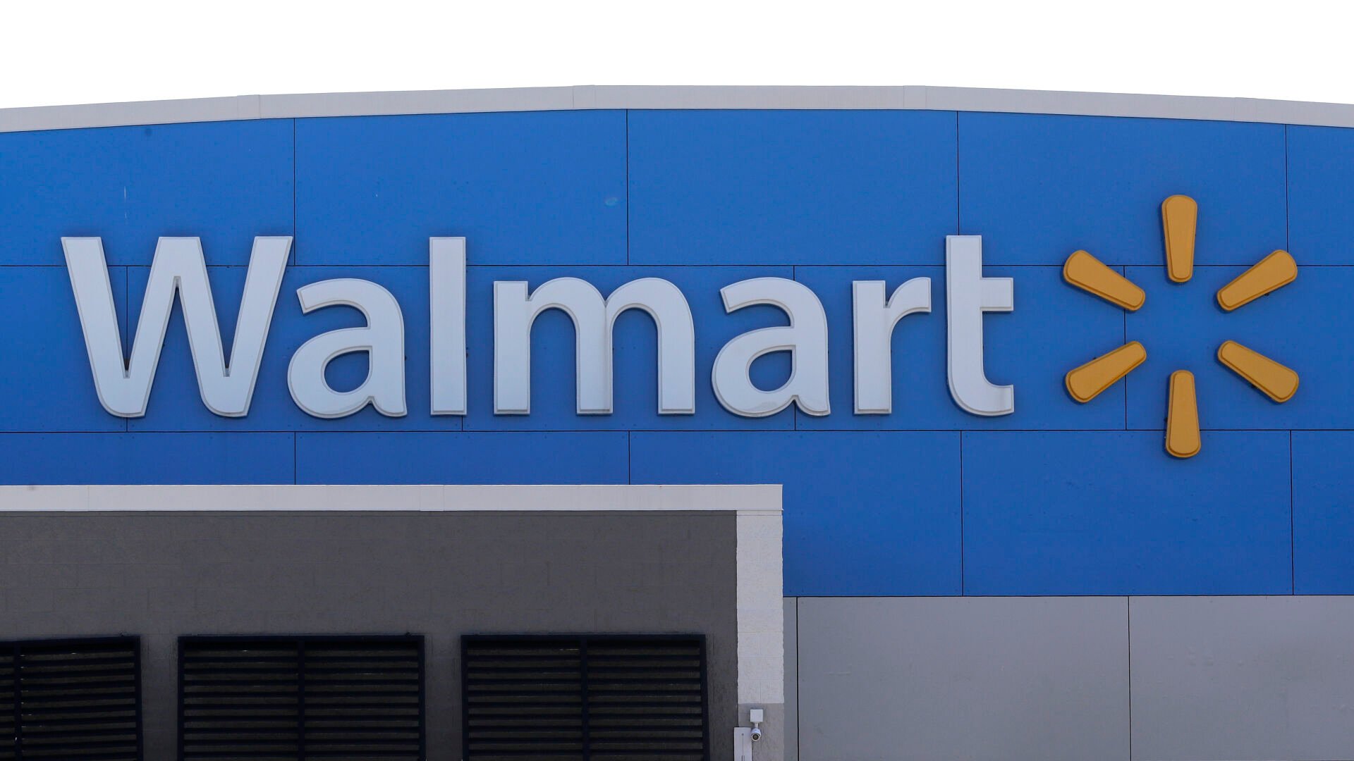 <p>FILE - In this Tuesday, Sept. 3, 2019, file photo, A Walmart logo is attached to the outside of a Walmart store in Walpole, Mass. </p>