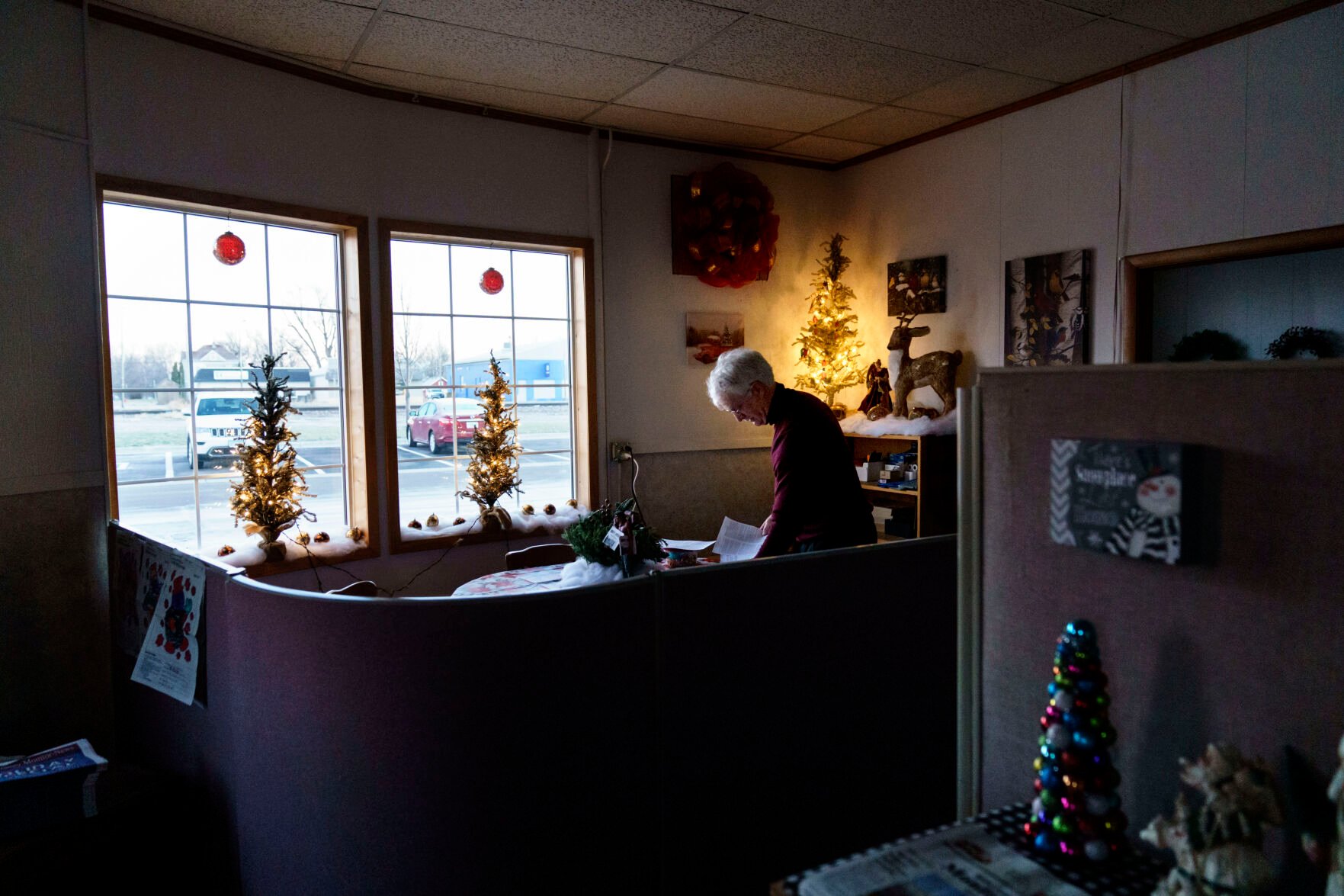 <p>Reed Anfinson, publisher of the weekly newspaper, The Swift County Monitor-News, works before office hours in Benson, Minn., Tuesday, Nov. 30, 2021. </p>