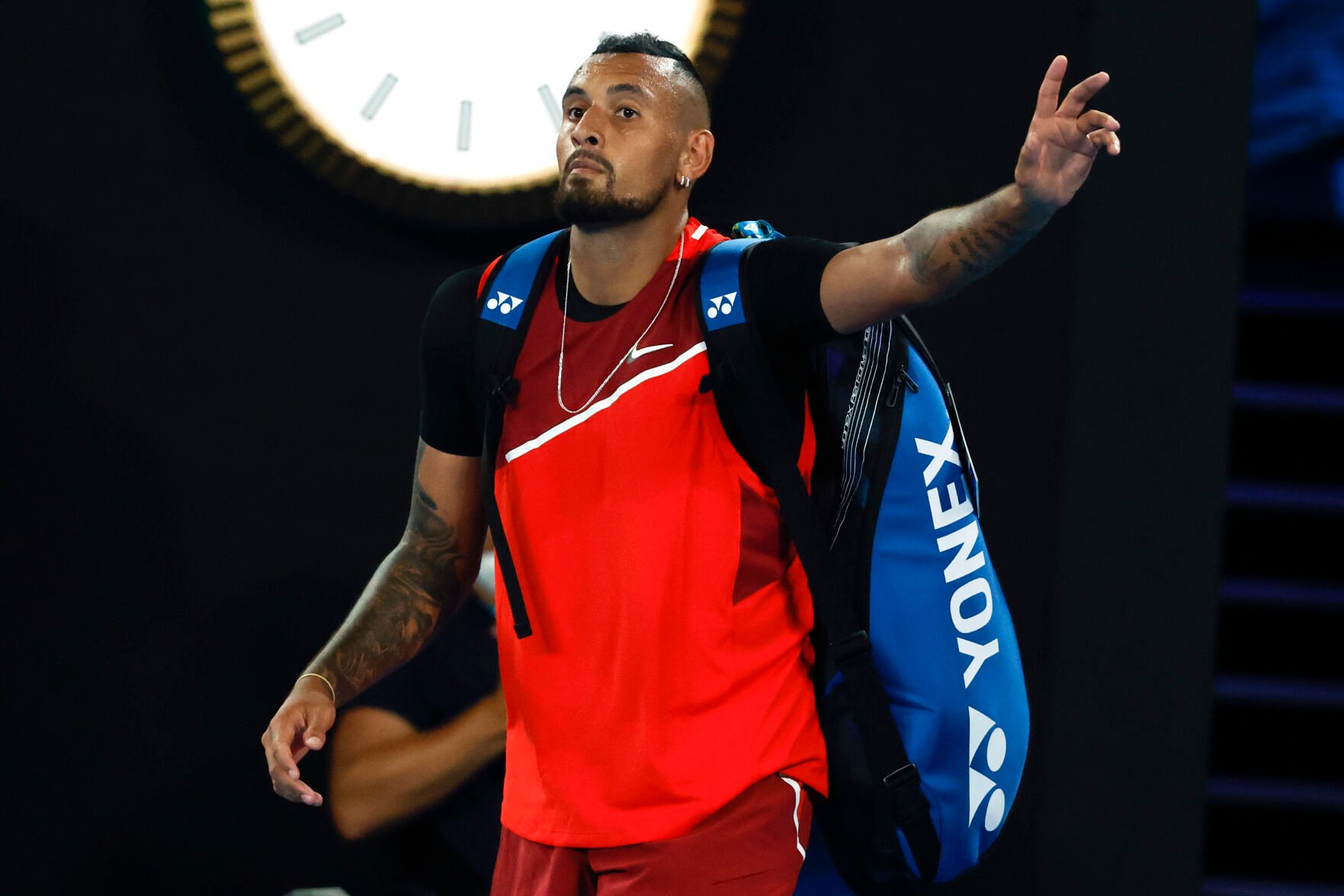 <p>FILE - Nick Kyrgios of Australia gestures as he walks from Rod Laver Arena following his second round loss to Daniil Medvedev of Russia at the Australian Open tennis championships in Melbourne, Australia, Thursday, Jan. 20, 2022. On Friday, Jan. 21, The Associated Press reported on stories circulating online incorrectly claiming three tennis players — Kyrgios, Nikoloz Basilashvili, and Dalila Jakupovic — were forced to drop out of this year’s Australian Open after they experienced chest-related health issues. (AP Photo/Hamish Blair)</p>