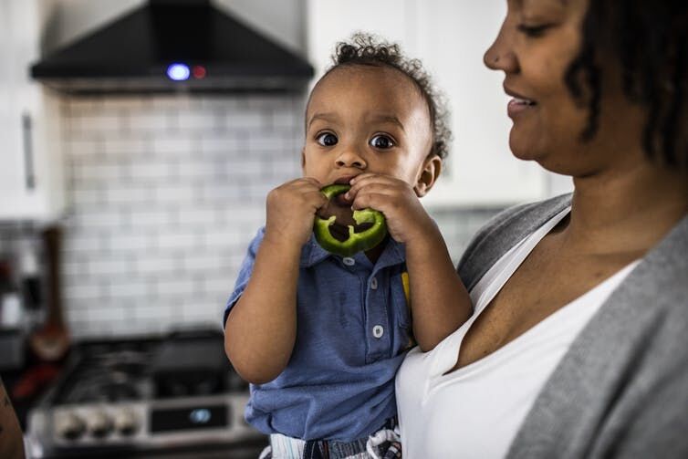 <p>If your child doesn’t like veggies at first, try, try again. <a class="source" href="https://www.gettyimages.com/detail/photo/toddler-eating-a-green-pepper-royalty-free-image/1339054800?adppopup=true">MoMo Productions/DigitalVision via Getty Images</a></p>