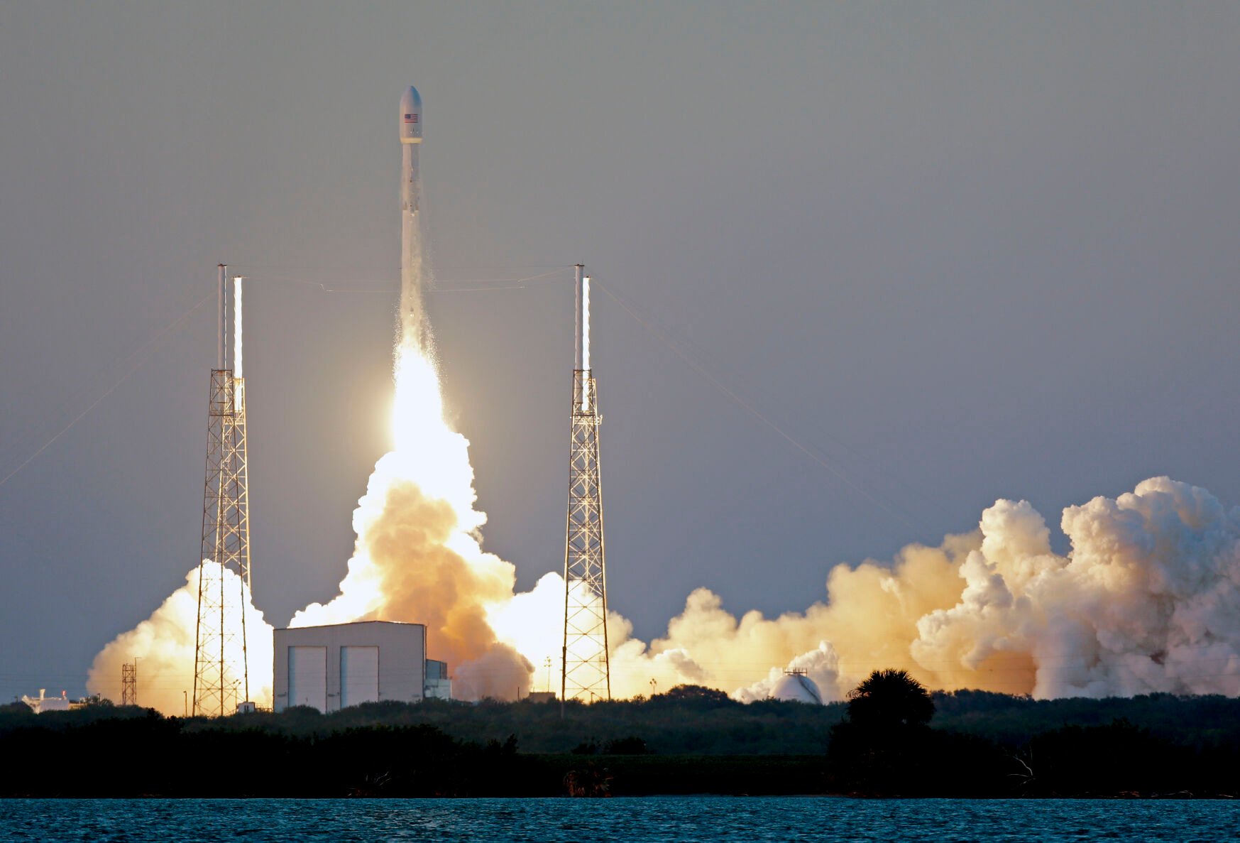<p>An unmanned Falcon 9 SpaceX rocket lifts off from launch complex 40 at the Cape Canaveral Air Force Station in Cape Canaveral, Fla., on Feb. 11, 2015.</p>
