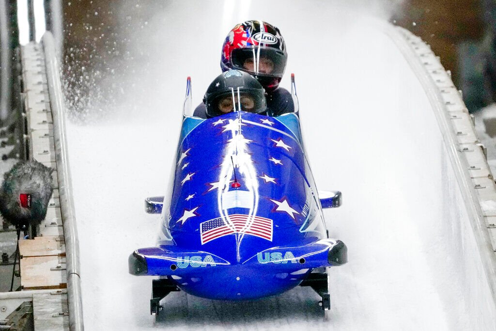<p>Elana Meyers Taylor and Sylvia Hoffman, of the United States, finish the women's bobsleigh heat 2 at the 2022 Winter Olympics, Friday, Feb. 18, 2022, in the Yanqing district of Beijing. </p>