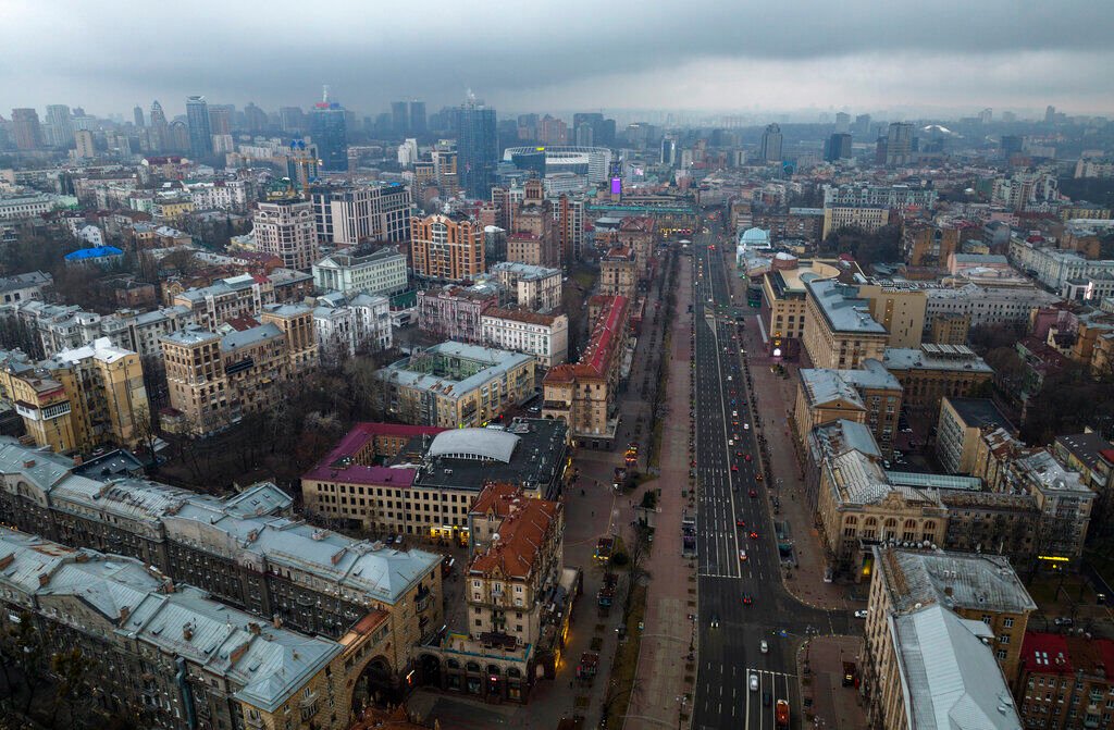 <p>FILE - Cars move down a street in Kyiv, Ukraine, Thursday, Feb. 24, 2022. </p>