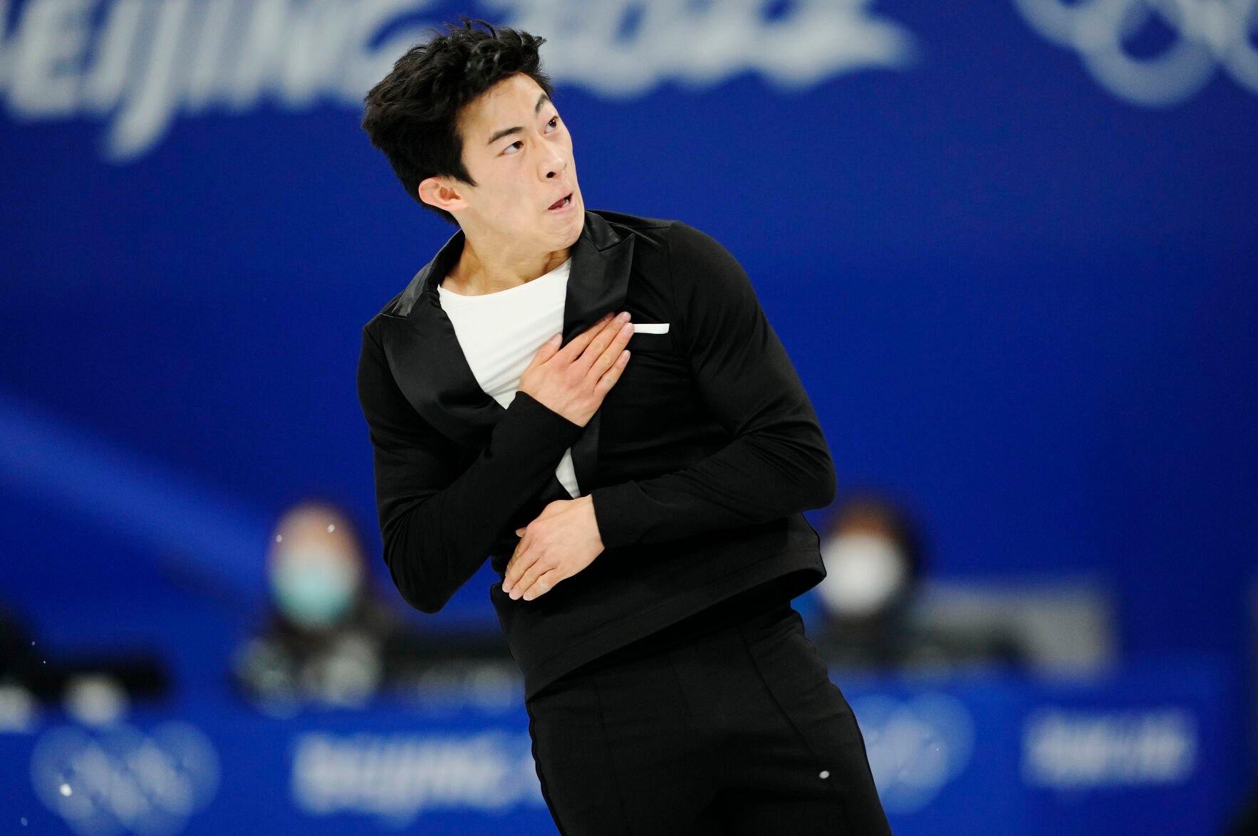 <p>United States' Nathan Chen competes during the men's singles short program portion of the figure skating team event at the Winter Olympics in Beijing on Friday, Feb. 4, 2022. </p>