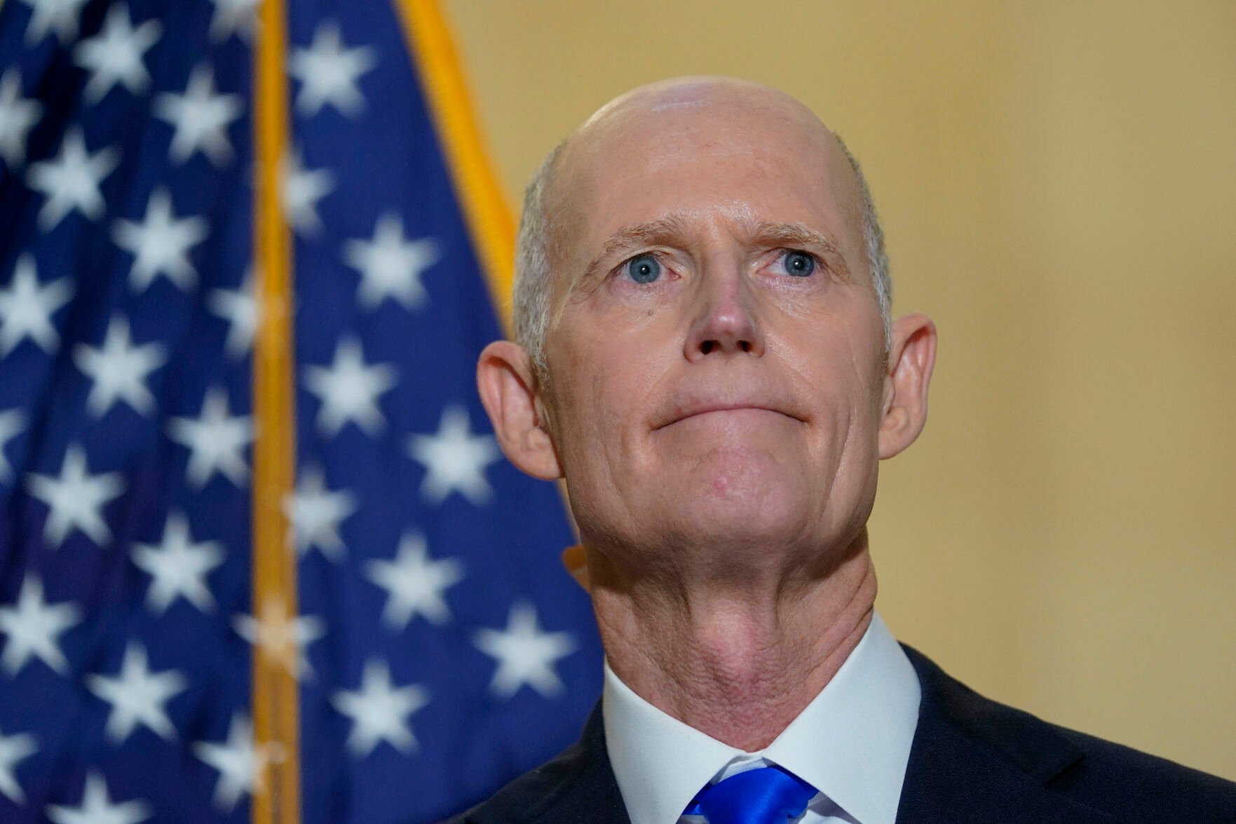 <p>FILE - Sen. Rick Scott, R-Fla., talks with reporters on Capitol Hill in Washington, on Jan. 20, 2022. He was talking about President Joe Biden's first year as president. Two widely supported bills are encountering delays in the Senate. The House easily approved the measures last week with broad bipartisan support.</p>