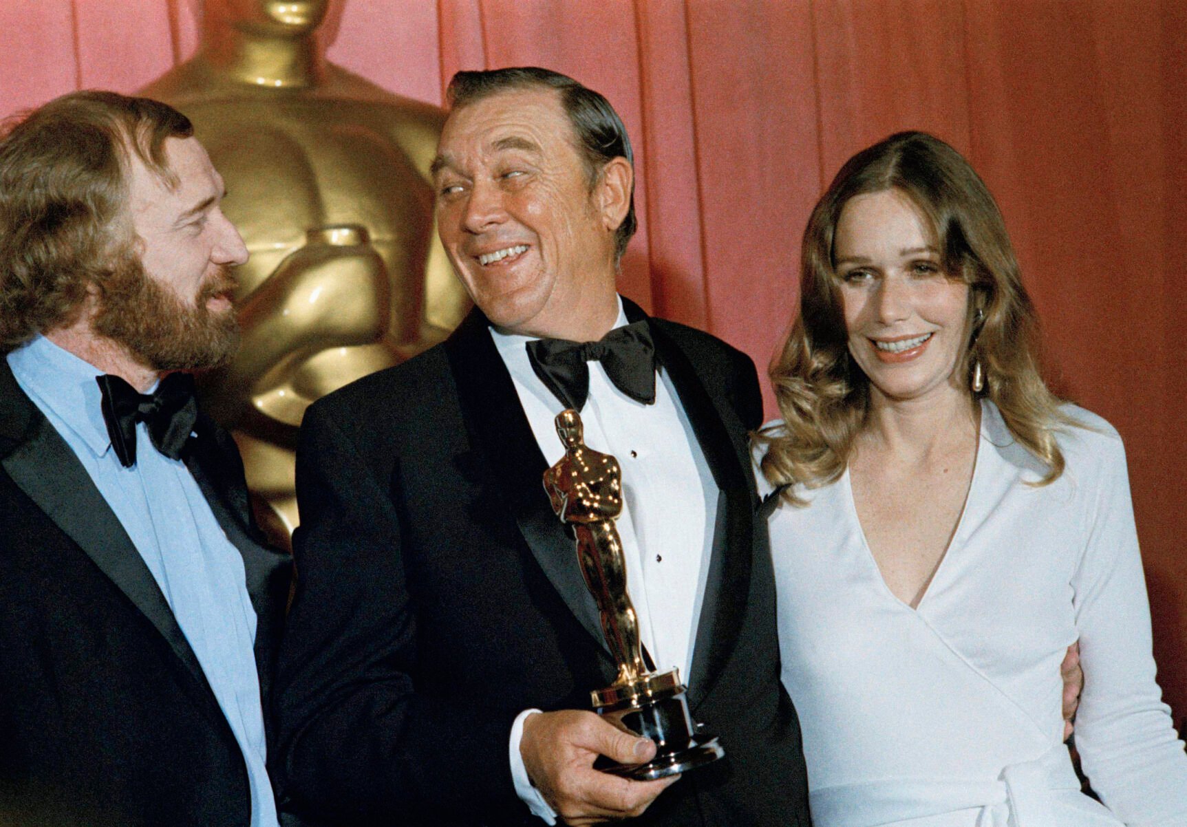 <p>FILE - Ben Johnson, center, best supporting actor, with Richard Harris and Sally Kellerman at the 1971 Academy Awards, presented March 27, 1972, at the Dorothy Chandler Pavilion, in Los Angeles.</p>